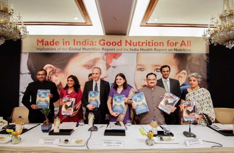 Delhi Global Nutrition Report 2015 Event speakers with copies of the GNR and IHR. Left to Right: K Srinath Reddy (PHFI), Purnima Menon (IFPRI), Lawrence Haddad (IFPRI), Min. Maneka Gandhi, Min. JP Nadda, Ramanan Laxminarayan (PHFI), Soumya Swaminathan (ICMR)